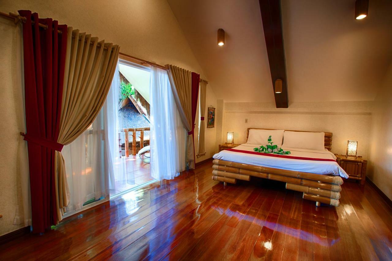 Pura Vida Beach & Dive Resort Dauin Buitenkant foto